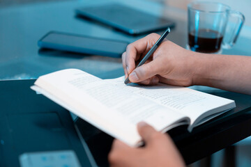 close up of person working on documents