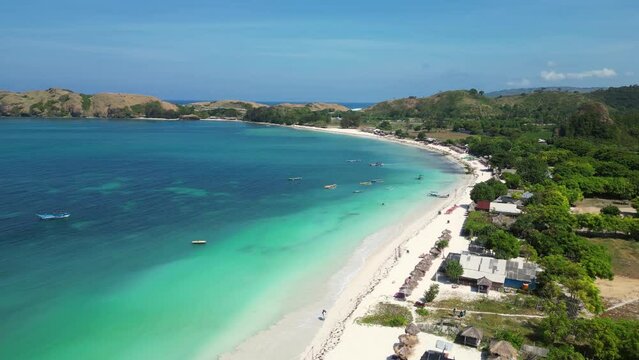 Lombok, Indonesia: Aerial drone footage of the stunning Tanjung Aan beach in the Kuta region of southern Lombok in Indonesia. Shot with a forward motion. 