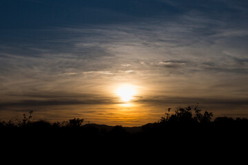 Sun Falling Through Clouds