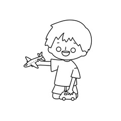 A young boy is holding a toy airplane and smiling