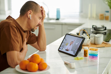 Man feeling unwell calling general practitioner to get prescription