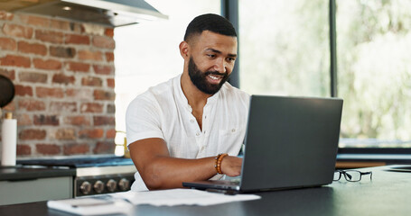 Man, paperwork and laptop with budget in kitchen for mortgage loan, investment planning or bills. Person, research and happy with finance documents in home with invoice for expenses, savings or taxes