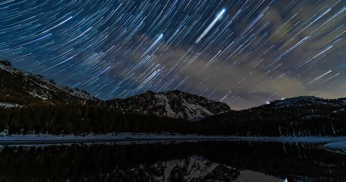 Time Lapse Stars Trails And Clouds Passing Over Lake Palu At Night