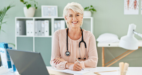 Mature doctor, woman and portrait in office with paperwork for healthcare prescription and medical...
