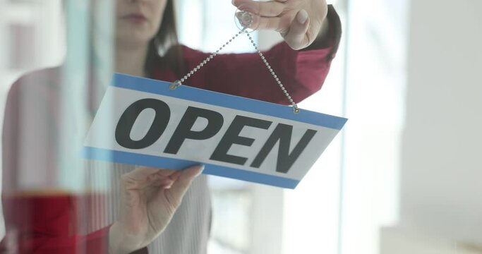 Store is open sign flips from closed to open