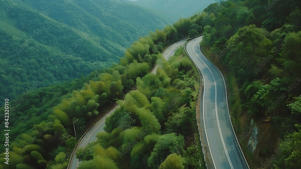 Poster aerial view of a road in the middle of the forest road curve construction up to mountain : generativ