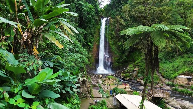 Aerial view of Gitgit waterfall with Balinese gate, Buleleng, Bali, Indonesia