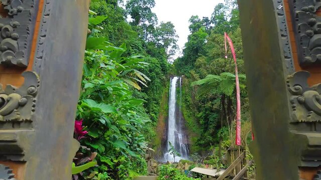 Aerial view of Gitgit waterfall with Balinese gate, Buleleng, Bali, Indonesia
