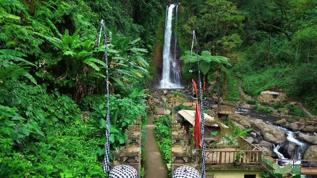 Aerial view of Gitgit waterfall with Balinese gate, Buleleng, Bali, Indonesia