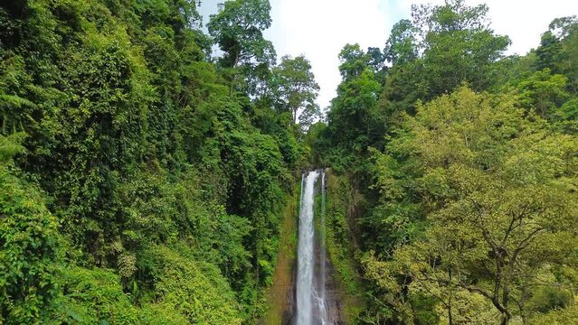 Aerial view of Gitgit waterfall with Balinese gate, Buleleng, Bali, Indonesia