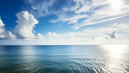 Obraz premium Blue sky over calm sea. Blue sea and sunny sky on horizon over calm water