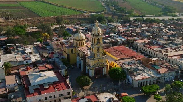 Forward flight closing in on Santuario Diosesano church in Tamazula. Jalisco, Mexico