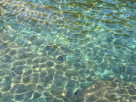 Sea clear aqua blue transparent surface