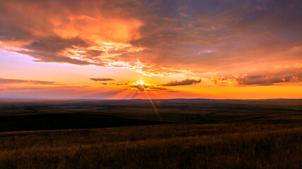 Magnificent landscape of the Karamuruntau ridge in the rays of the setting sun
