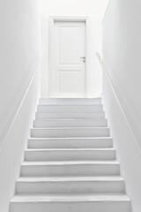 Plain door at the top of a simple, minimalist staircase. The steps are clean lines, and the background is a solid color, emphasizing the ascent to the door