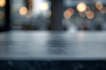 Fototapeta premium Closeup of a dark greyish elegant table with a soft defocused background with bokeh