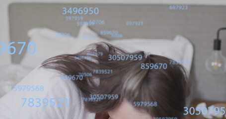 Image of numbers over senior caucasian woman coughing