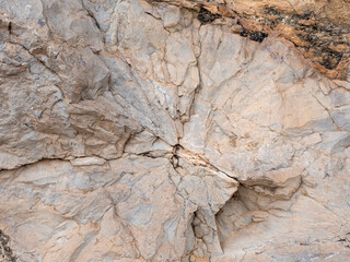 rock with a lot of cracks and holes