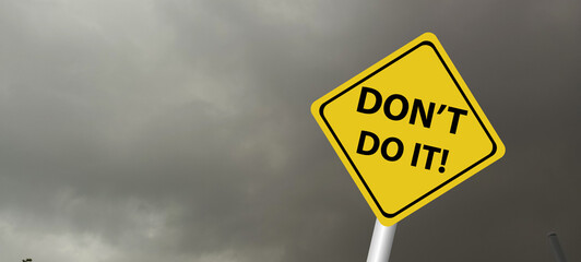 Hurricane season with symbol sign against a stormy background and copy space. dirty and angled sign adds to the drama. hurricane sign, hurricane season sing on cloudy background