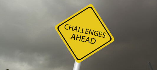 Challenges ahead sign. Black on yellow diamond background. Road safety signs and symbols.