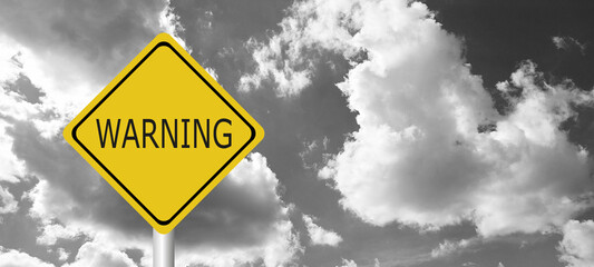 Hurricane season with symbol sign against a stormy background and copy space. dirty and angled sign adds to the drama. hurricane sign, hurricane season sing on cloudy background