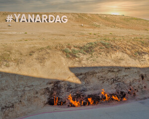 A view of the Yanar Dag burning mountain in Baku, Azerbaijan, showing flames emerging from the...