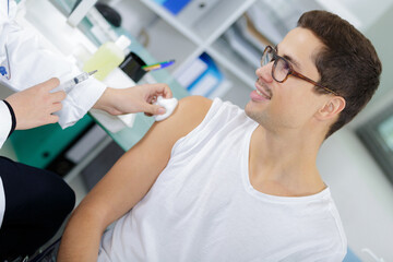 doctor and patient after blood test injection