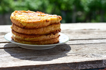 French toast  and white cheese. Rustic breakfast  made from deep fried   bread   with organic free range   eggs