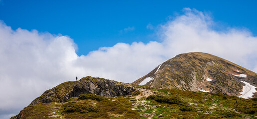 Landscape with Mount Hoverla hanging peak of the Ukrainian Carpathians against the background of the sky and clouds