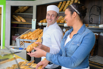 view of a team of bakers working at the bakery