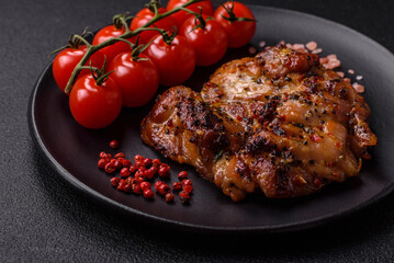 Delicious juicy chicken steak with salt, spices and herbs