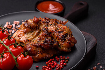 Delicious juicy chicken steak with salt, spices and herbs