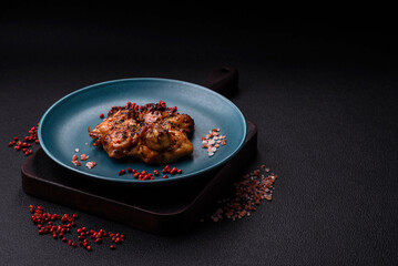 Delicious juicy chicken steak with salt, spices and herbs