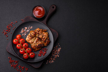 Delicious juicy chicken steak with salt, spices and herbs