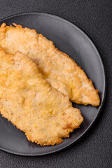 Delicious juicy chicken chops in batter with salt, spices and herbs