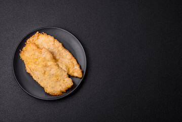 Delicious juicy chicken chops in batter with salt, spices and herbs