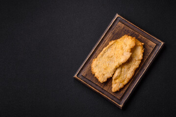 Delicious juicy chicken chops in batter with salt, spices and herbs