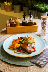 Smoked Irish brisket, caper puree, grilled vegetables, roasted cheddar cheese potatoes