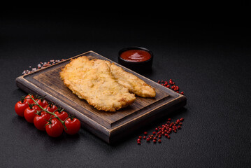 Delicious juicy chicken chops in batter with salt, spices and herbs