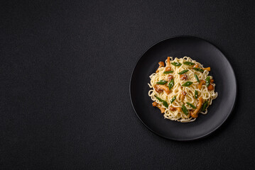 Delicious Asian cuisine dish with rice noodles, peppers, mushrooms and spices