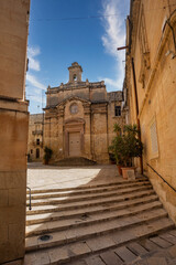 Quaint Chapel of Our Lady of Damascus nestled in historic Birgu with classic Maltese architecture...