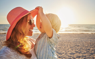 Happy mother, kid and beach with hug in sunset for outdoor holiday, weekend or bonding in nature....