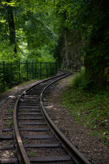 Fototapeta premium Old railway in an old mountain forest.