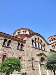 Obraz premium Exterior view of the Church of Saint Nicholas, located on Eleftheriou Venizelou avenue in Kallithea, Attica, Greece.