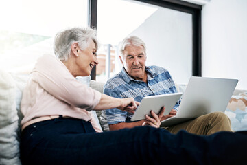 Laptop, tablet and senior couple on sofa planning for retirement fund, savings and pension. Reading, relax and elderly man and woman with computer and digital technology for bills payment at home.