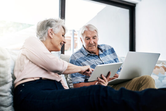 Laptop, tablet and senior couple on sofa planning for retirement fund, savings and pension. Reading, relax and elderly man and woman with computer and digital technology for bills payment at home.