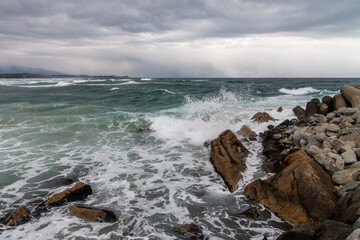 waves crashing on rocks