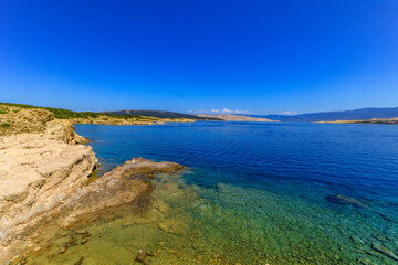 Fototapeta premium Croatian wildlife blue Adriatic Sea rocky beaches for naturists