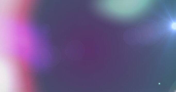 Image of light spots over black background