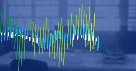 Data processing on blue and green graph over computer on office desk, copy space